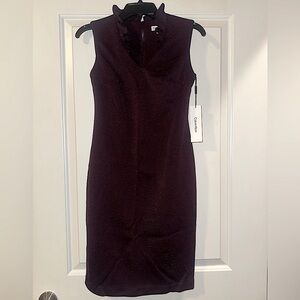 Calvin Klein
Size 2
Purple Sparkle Dress